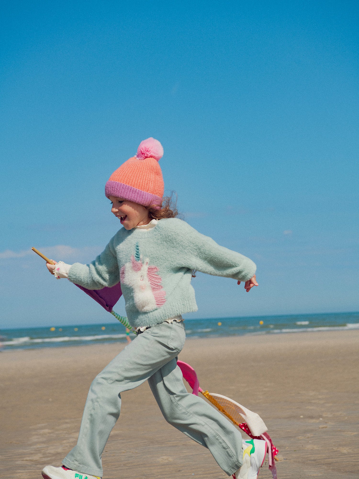 Pull en maille plume animation licorne