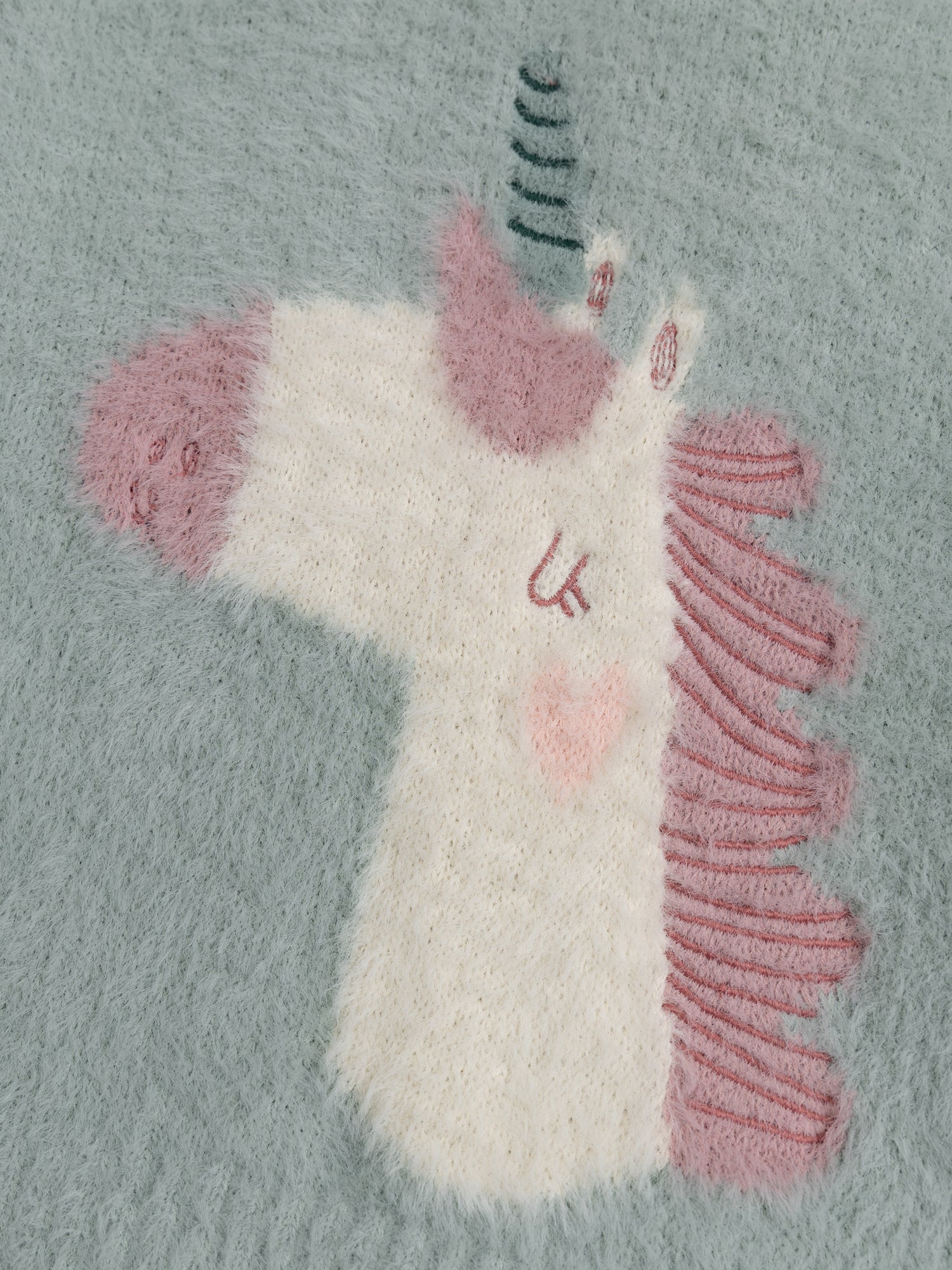 Pull en maille plume animation licorne