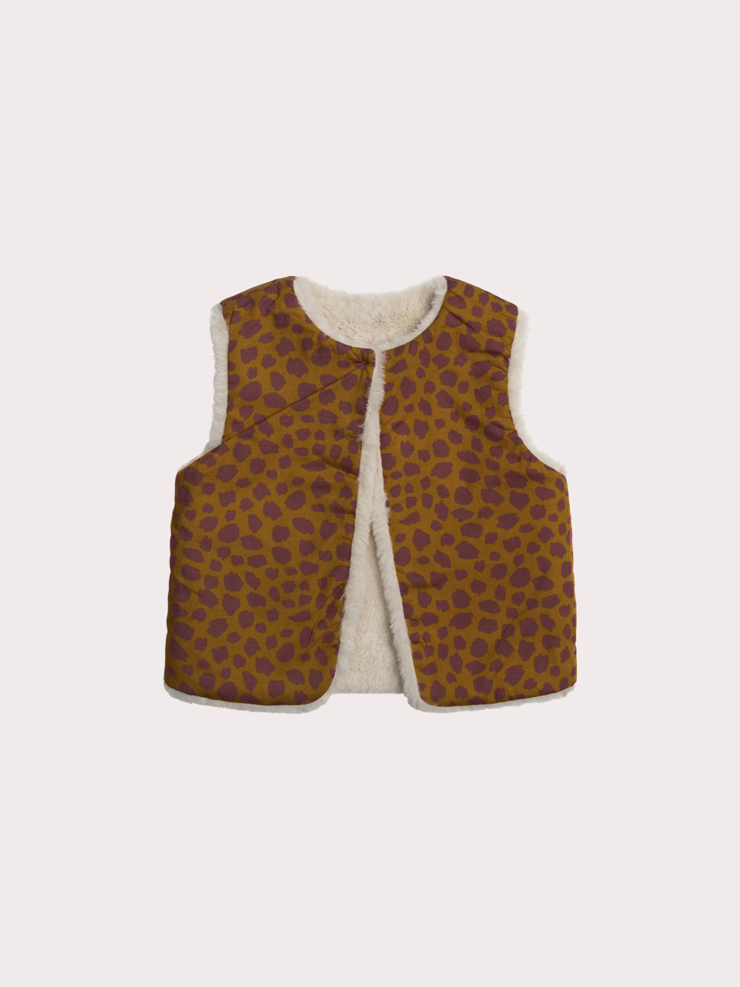 Gilet sans manche en fourrure synthétique réversible