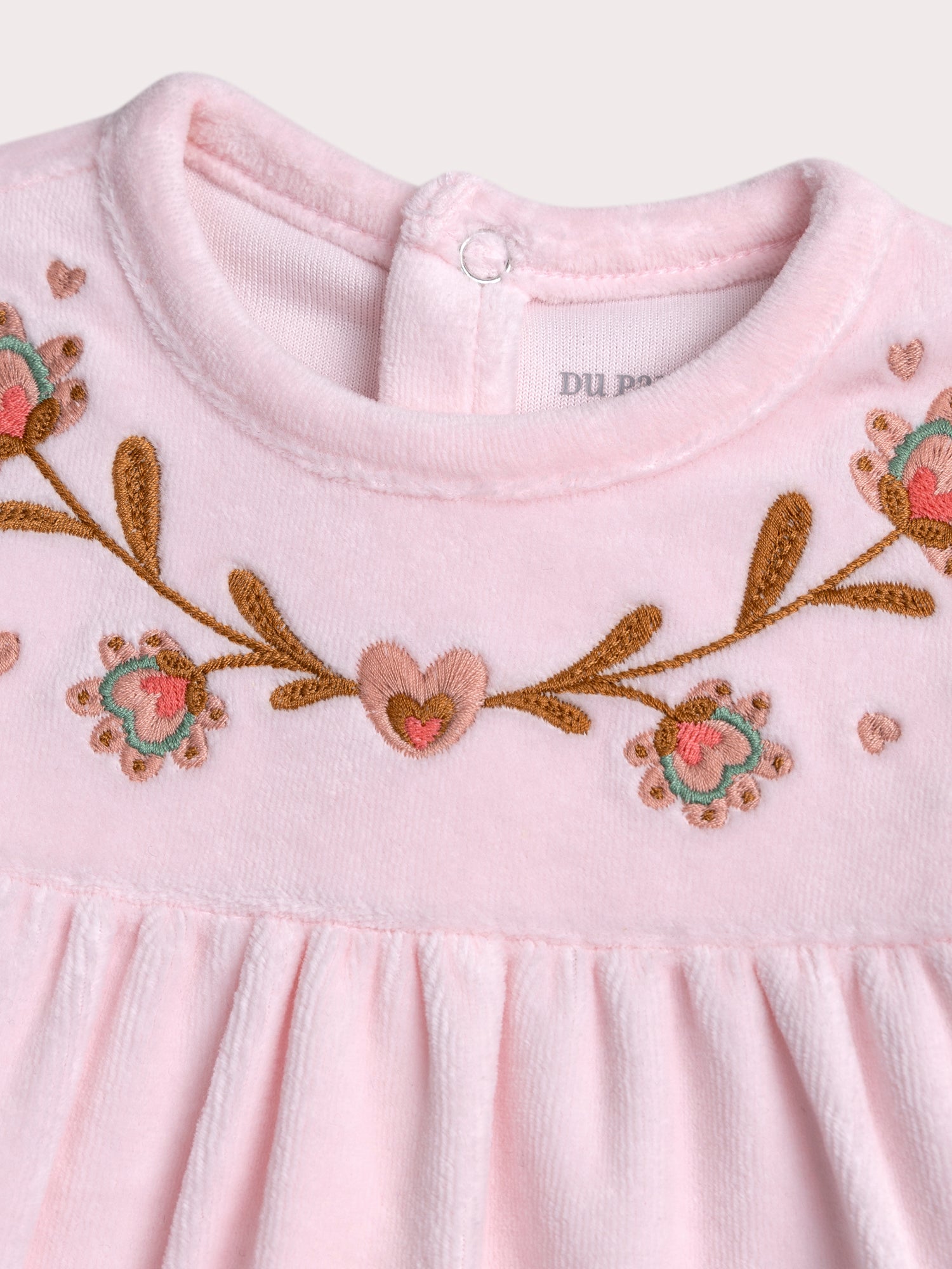 Grenouillère rose pale pour bébé fille
